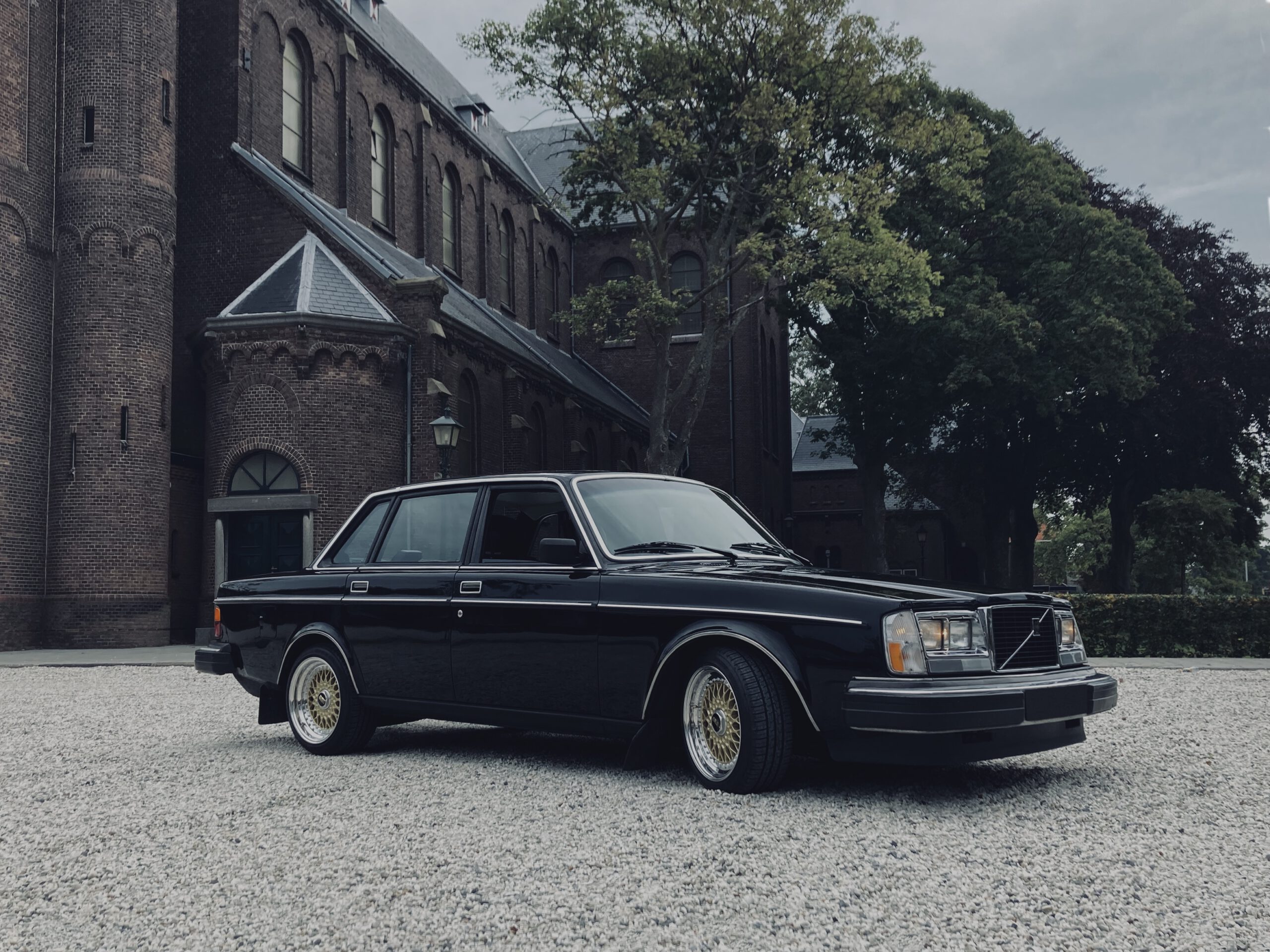 Volvo 244 / 240 sedan with gold BBS RS 112 wheels. Front 7.5J Rear 8.5J wide